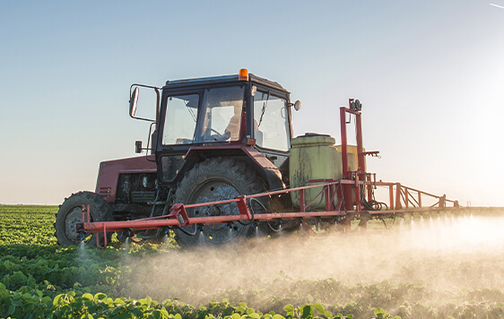 Tractor with Chemical Sprayer Attachment